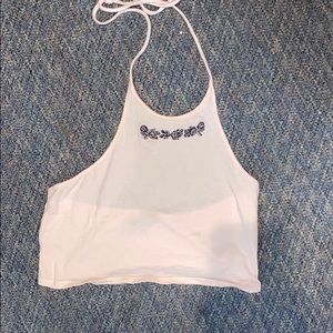 PALE PINK HALTER CROP WITH ROSE DESIGN
